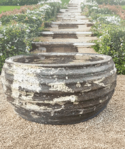 Thai limestone pots -- Seedpod Pot with natural aged limestone finish at Thomson's Garden Centre Orange NSW