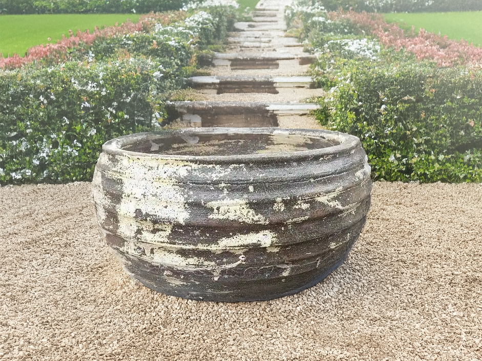 Thai limestone pots -- Seedpod Pot with natural aged limestone finish at Thomson's Garden Centre Orange NSW